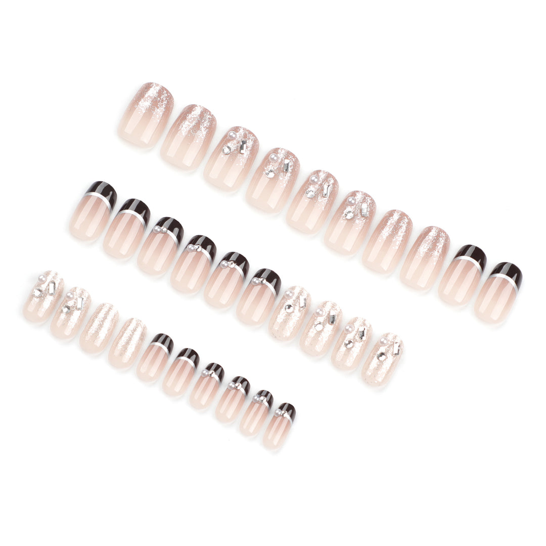 Artistic nail designs with glitter and rhinestone accents Bowlift