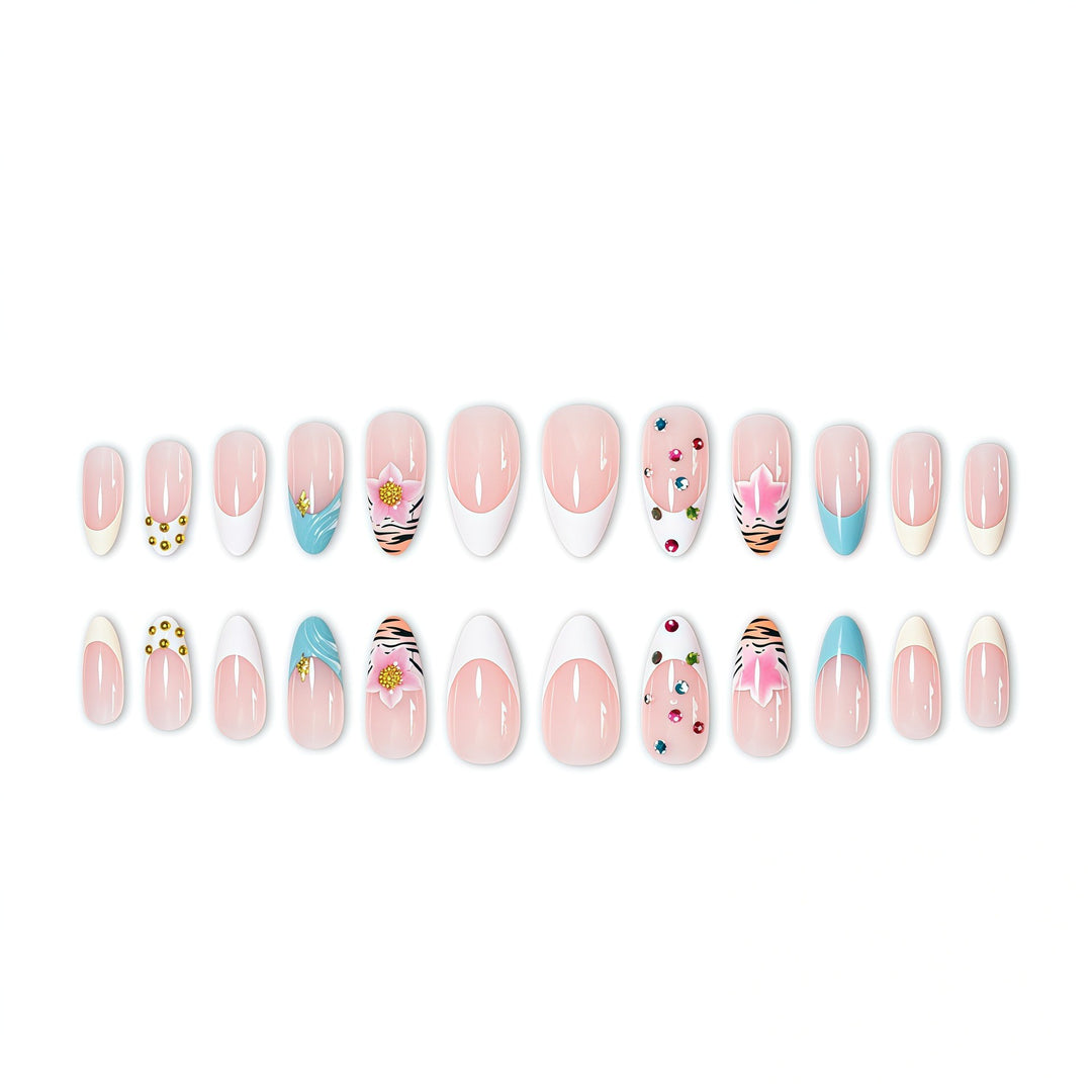 Artistic Stiletto Nail Enhancements with Unique Emblem Accents Bowlift