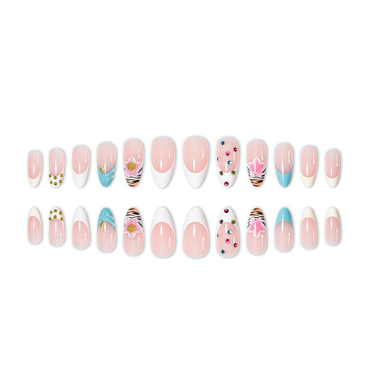 Artistic Stiletto Nail Enhancements with Unique Emblem Accents Bowlift