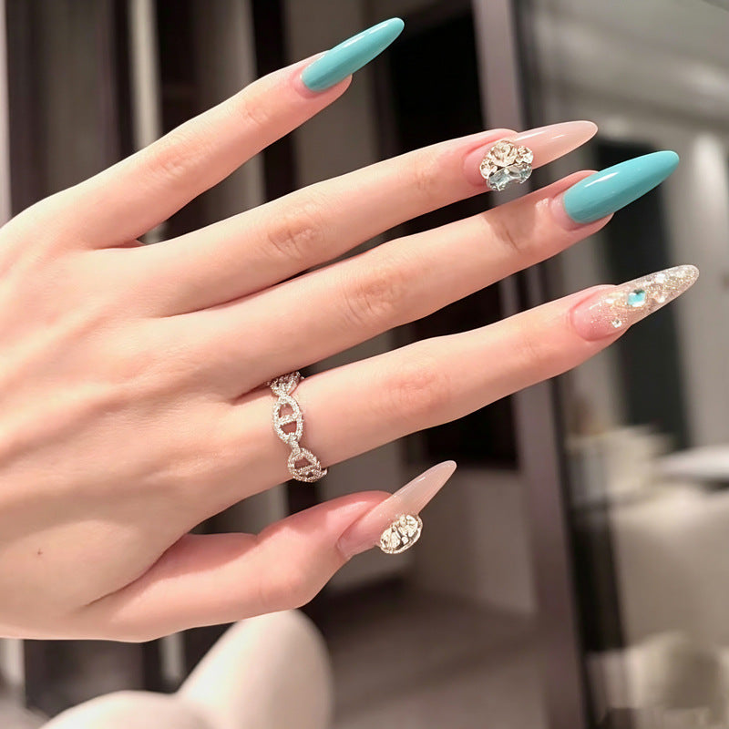 Artificial nail set with sparkling glitter accents Bowlift