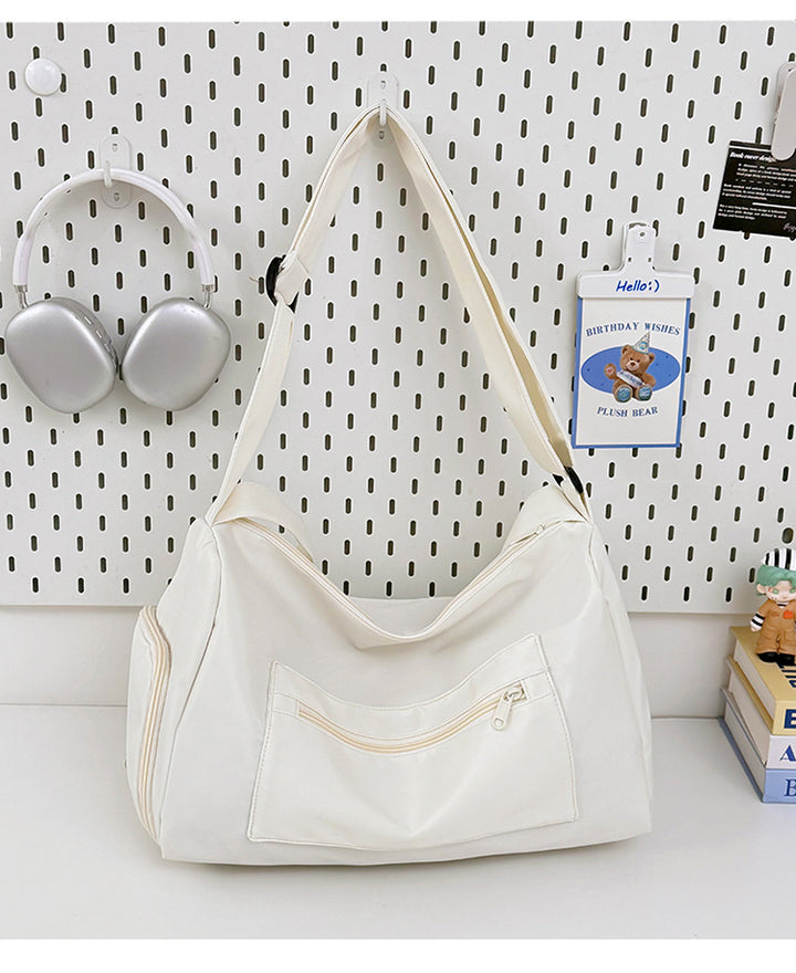 Sporty shoulder bag with spacious interior and sturdy carrying strap Bowlift