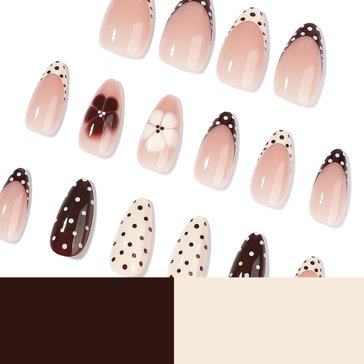 Artful nail art with floral design and various patterns Bowlift