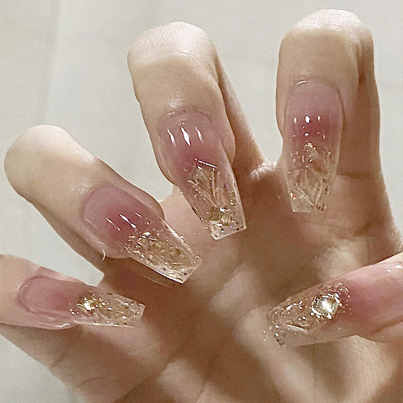 Artificial nails with glamorous glitter accents Bowlift