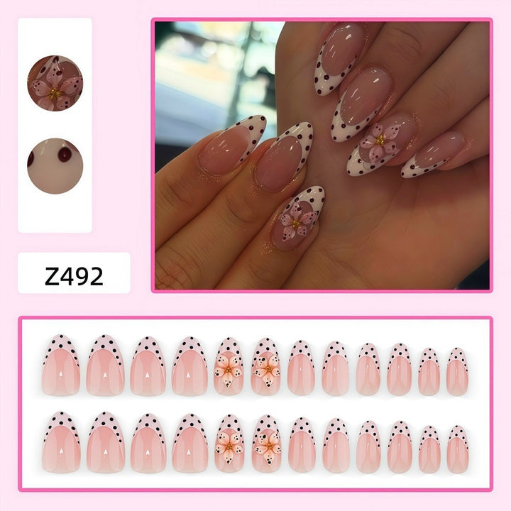 Creative artificial nails with floral design and glamorous accents Bowlift