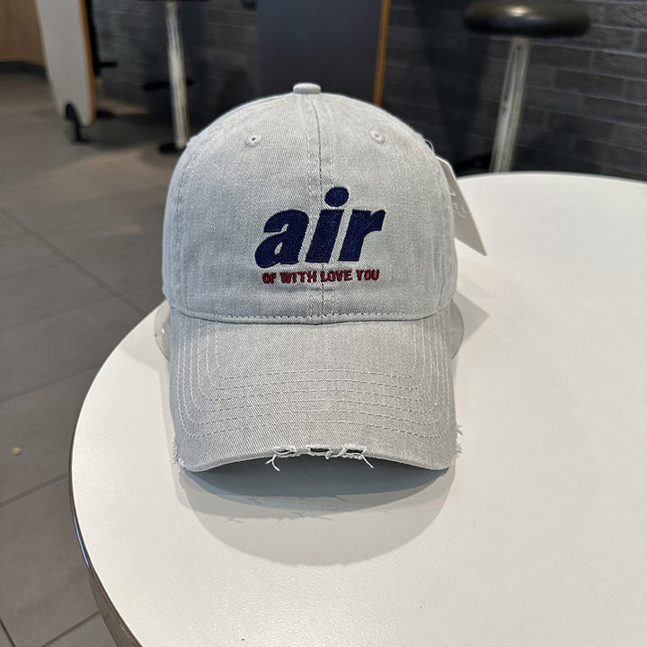 Distressed Denim Baseball Cap with Unique Embroidery