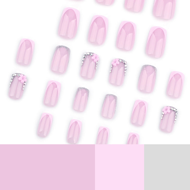 Artful gel nails with elegant floral design and glitter accents Bowlift
