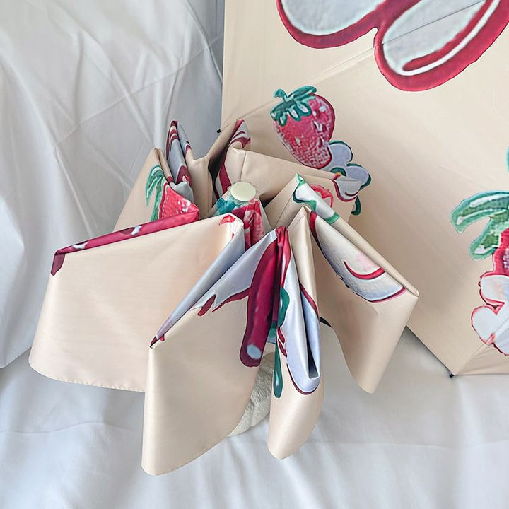 Ladies folding umbrella with cheerful strawberry motif Bowlift