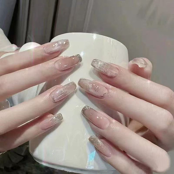 Glamorous artificial nails with rhinestone details Bowlift
