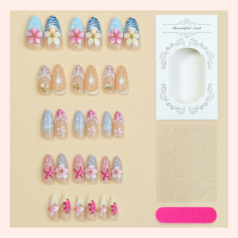 Creative nail art set with floral accents and pastel motifs Bowlift