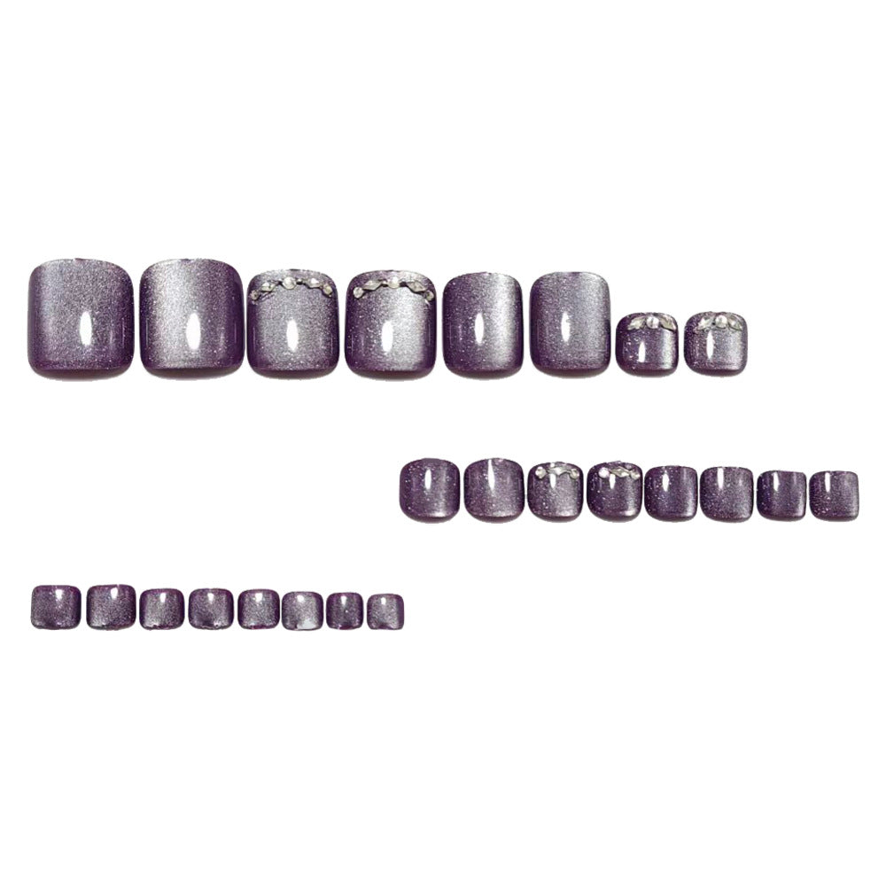 Shiny toenail art with rhinestone embellishment Bowlift