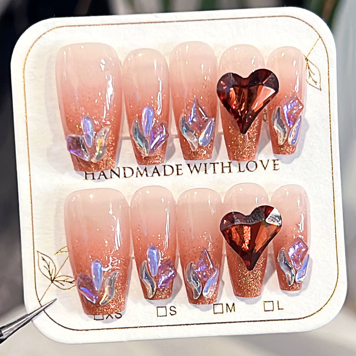 Artistic acrylic nails with heart design and sparkling accents Bowlift