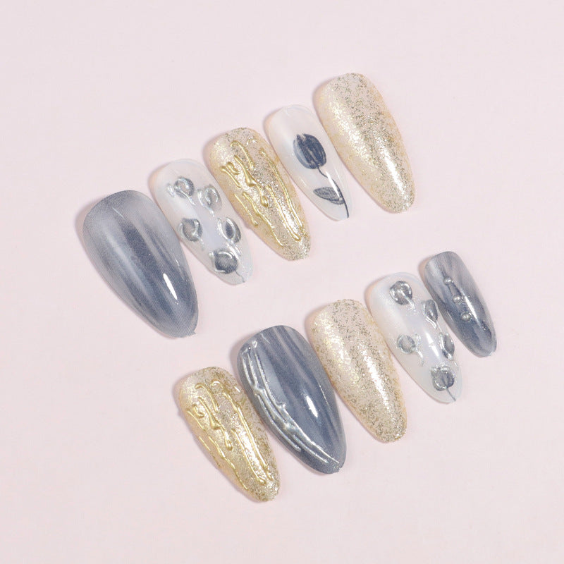 Artistic Stiletto Press-On Nail Design with Contemporary Accents Bowlift