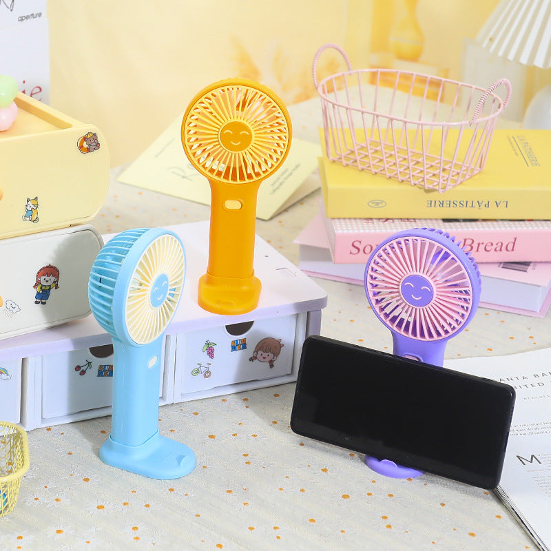 Ladies Portable Hand Fan with Smiling Face and USB Charging Function Bowlift