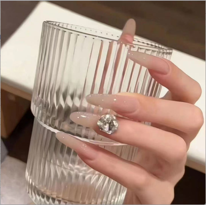 Elegant artificial nails with glitter and crystal accents Bowlift