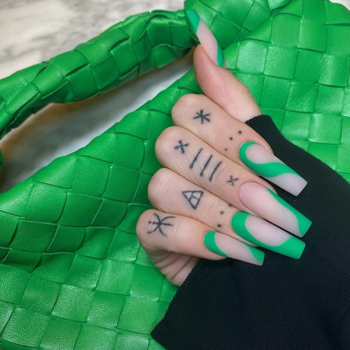 Artful nail art with modern French tip and colorful accents Bowlift