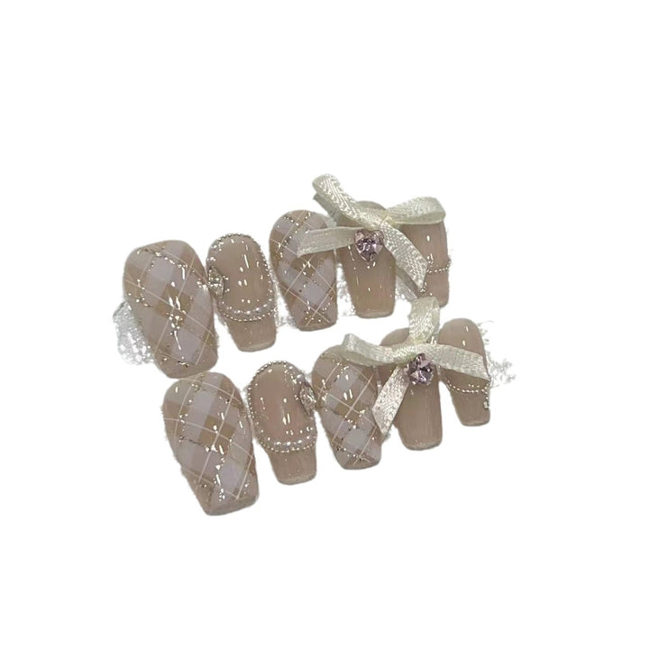 Elegant Press-On Nail Art Set with Ribbons and Gemstone Accents Bowlift