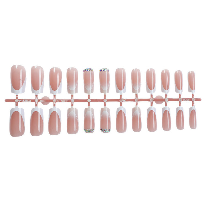 Artificial nail set with elegant ombre accents and seductive rhinestones Bowlift