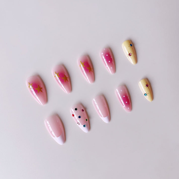 Artificial nail set with creative 3D designs and glitter accents Bowlift