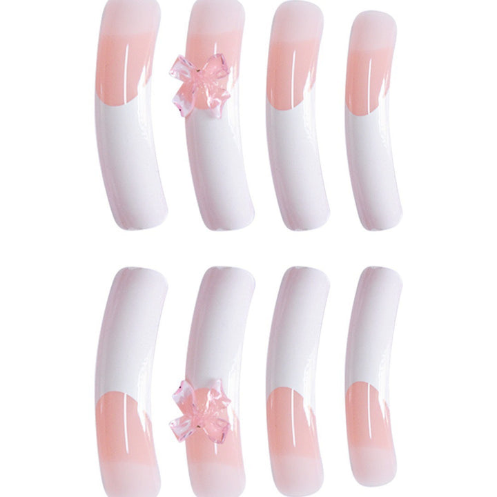 Elegant Nail Art Enhancements with Decorative Bow Accents Bowlift