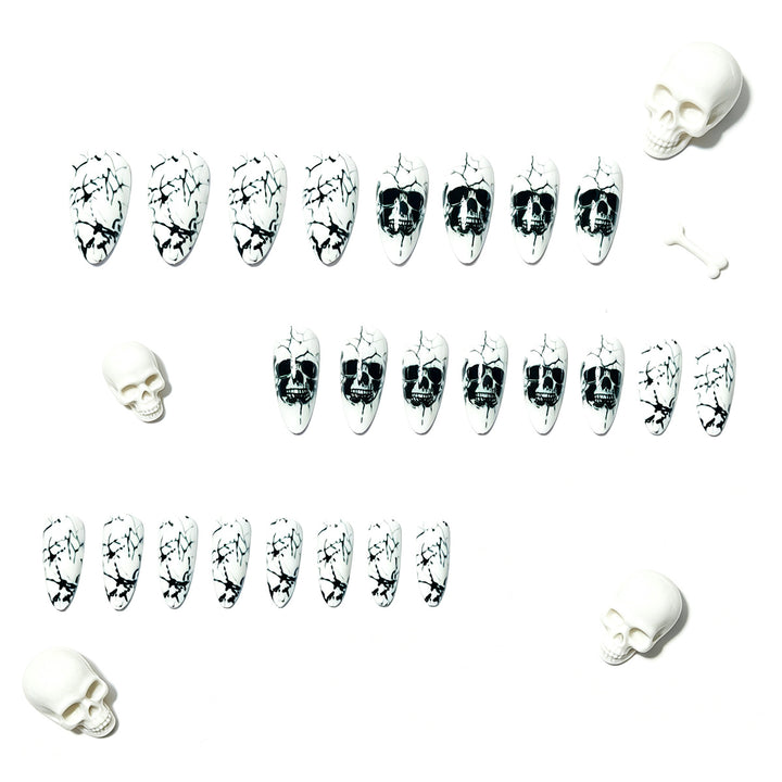 Artificial nails with playful skull design and crackle effects Bowlift
