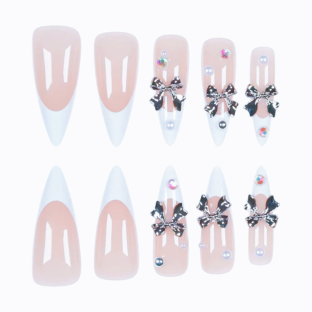 Acrylic nail set with elegant bows and sparkling accents Bowlift