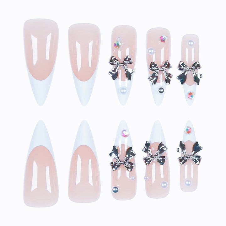 Acrylic nail set with elegant bows and sparkling accents Bowlift