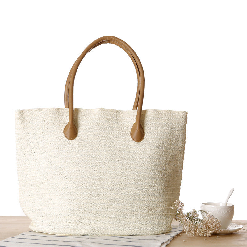 Spacious straw shopper with leather carrying handles Bowlift