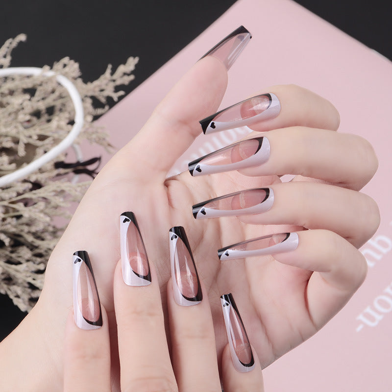 Elegant Stiletto Press-On Nails with Artistic Design Bowlift