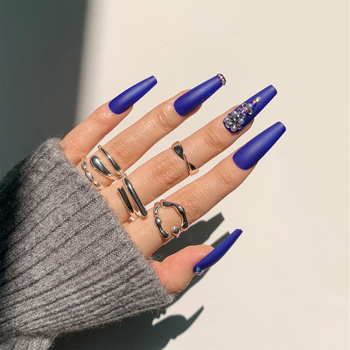 Nail extensions with elegant rhinestone embellishments Bowlift
