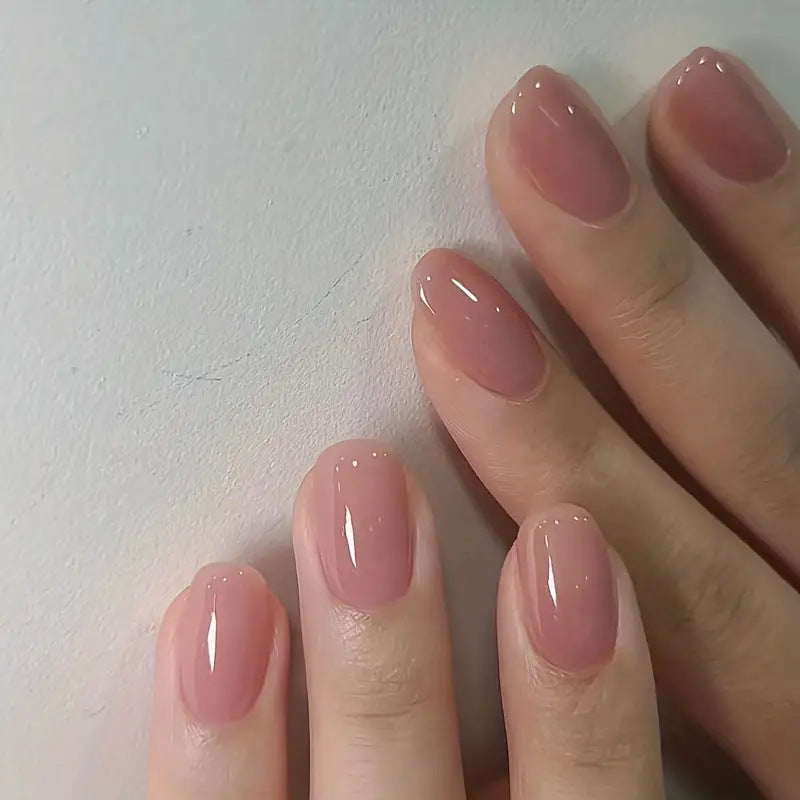 Artificial nail set with glossy finish and elegant accents Bowlift