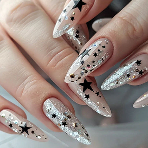 Artistic stiletto nails with glitter and star design Bowlift