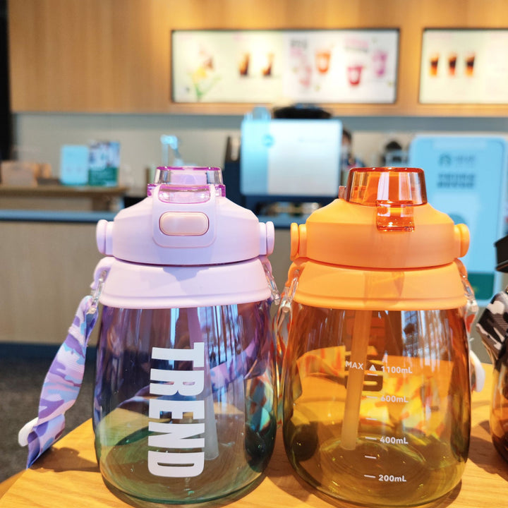 Women's multifunctional water bottle with safety closure and ergonomic carrying handle Bowlift