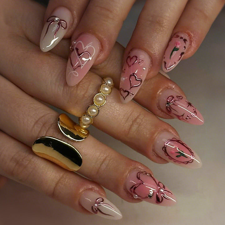 Artificial nail set with romantic hearts and bows design Bowlift