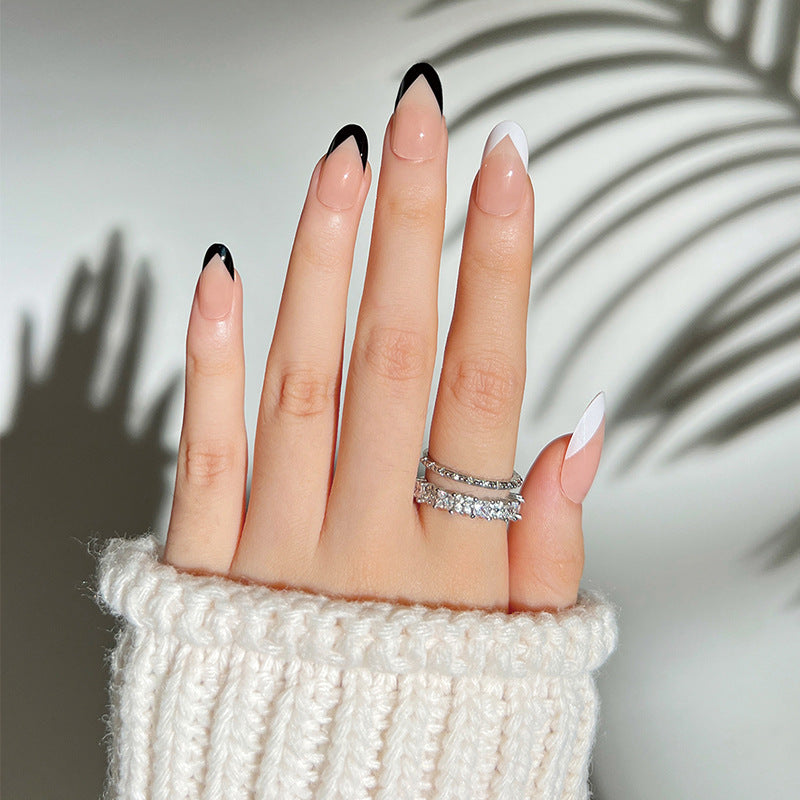 Artificial stiletto nails with elegant design and glamour embellishments Bowlift