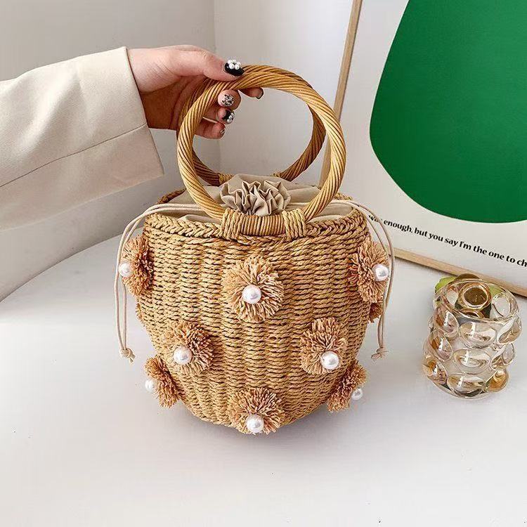Refined handbag with pearl applications Bowlift