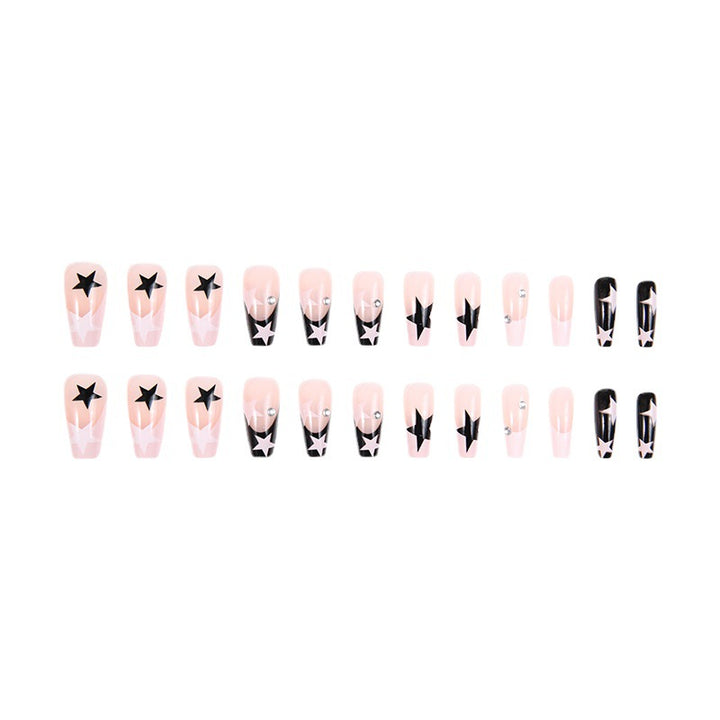 Artificial nail set with glamorous star design and sparkling accents Bowlift