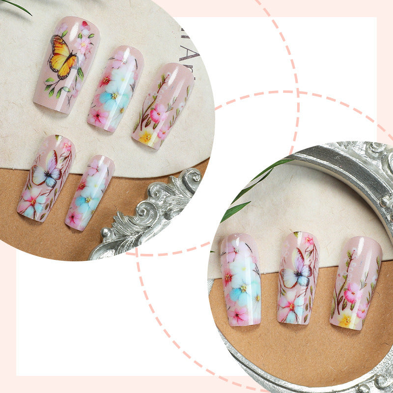 Artificial nail set with floral motifs and butterfly design Bowlift
