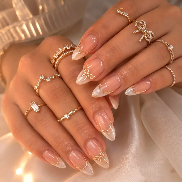 Elegant Stiletto Press-On Nails with Metallic Accents Bowlift