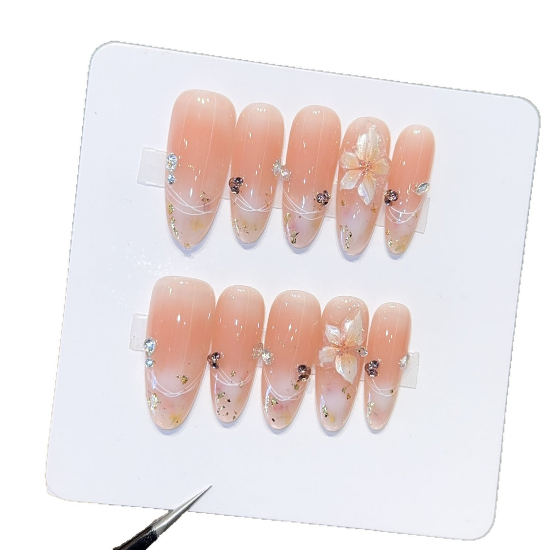 Artificial nails with delicate flower and glitter detail Bowlift