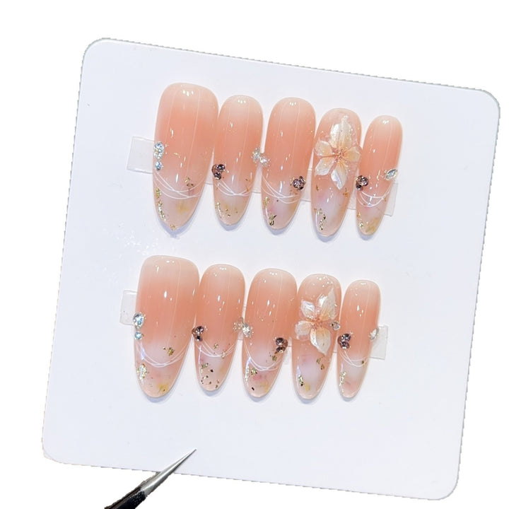 Artificial nails with delicate flower and glitter detail Bowlift