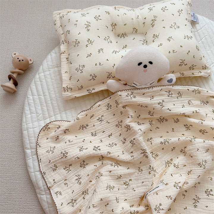 Unisex Muslin Blanket with delicate floral design and elegant ruffles Bowlift