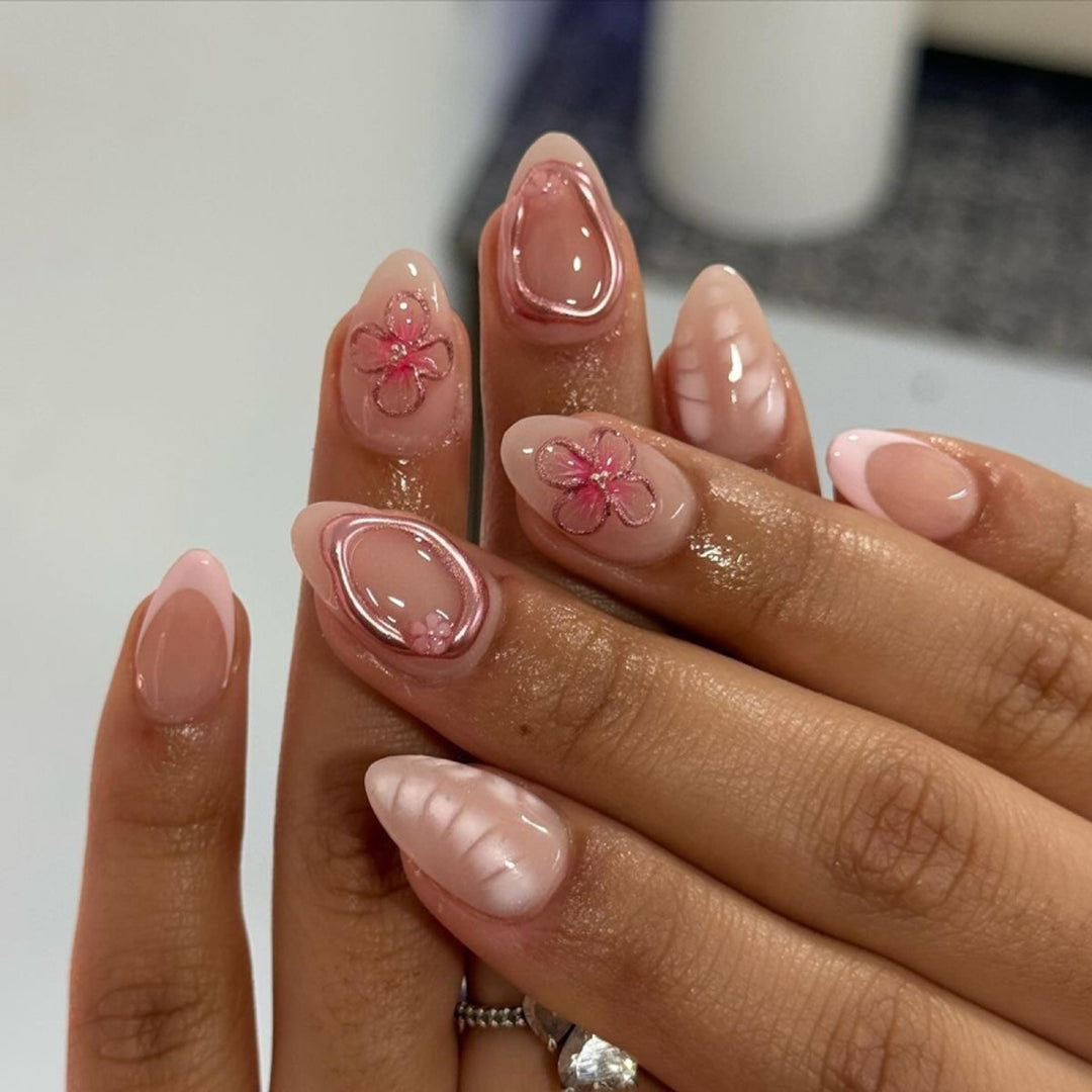 Artistic acrylic nails with floral design Bowlift