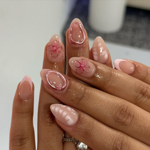 Artistic acrylic nails with floral design Bowlift