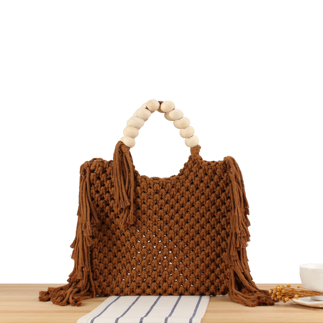 Creative crochet handbag with decorative fringes Bowlift