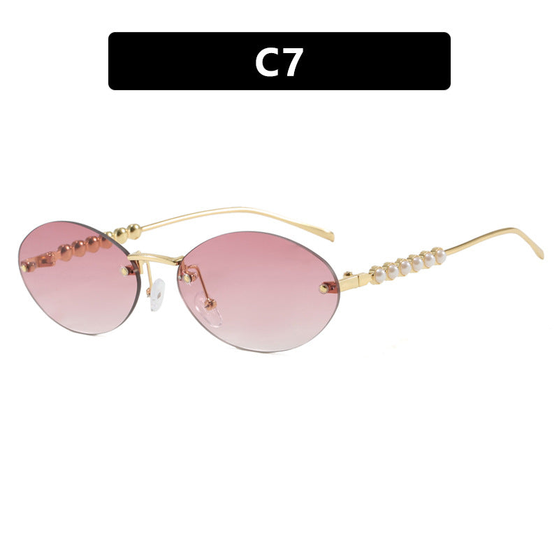 Women's stylish oval sunglasses with elegant embellishments Bowlift