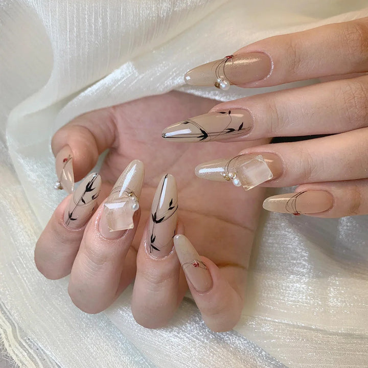 Glamorous Press-On Nail Set with Decorative Gemstone Accents Bowlift