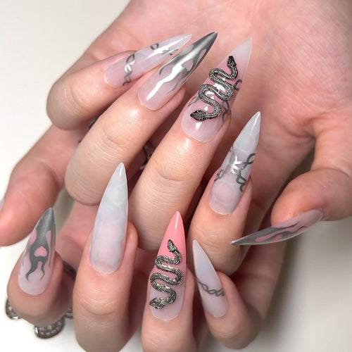 Artistic stiletto nails with snake motif Bowlift
