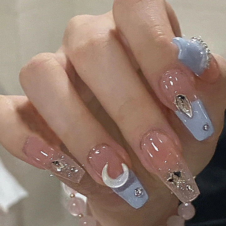 Artificial nails with glitter accents and playful motifs Bowlift