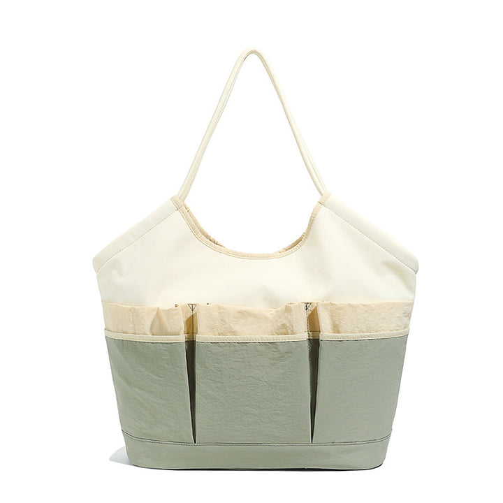Generous Tote Bag With Multiple Outside Pockets Bowlift