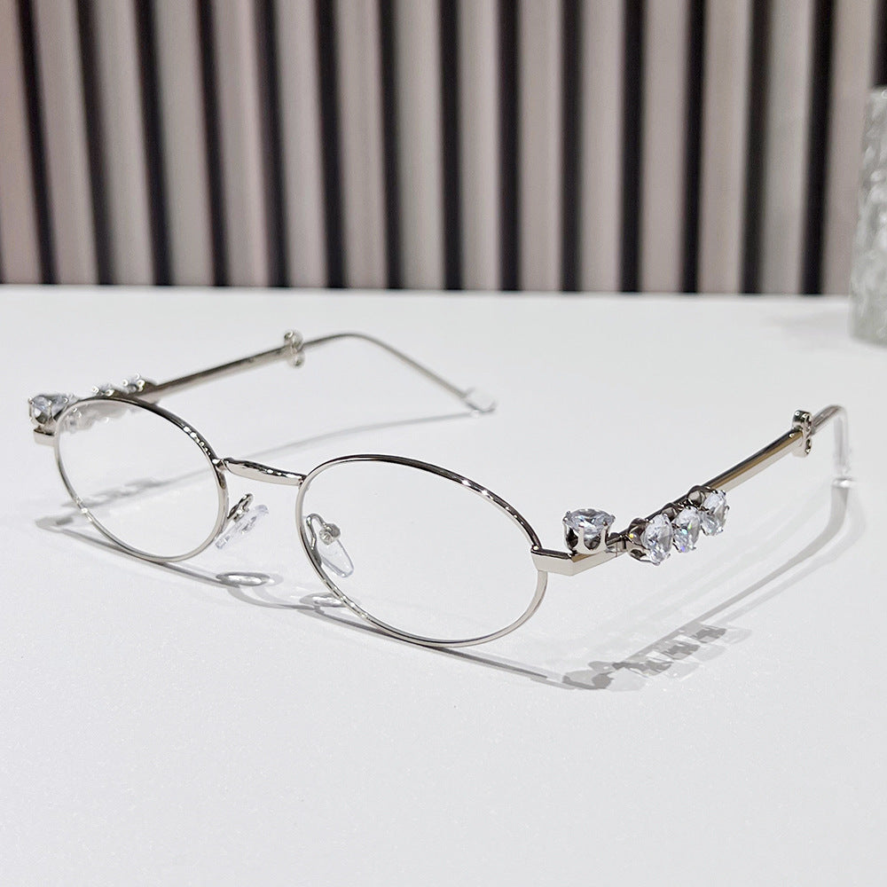 Fashion-Forward Oval Sunglasses with Crystal Accents Bowlift